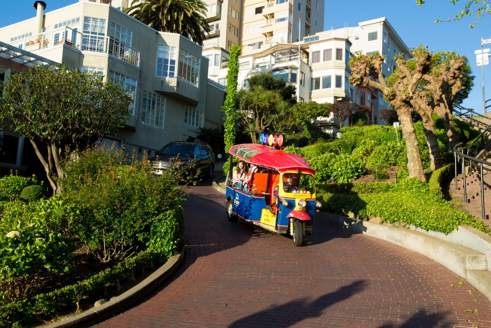 Small group touring San Francisco's Lombard Street in a Lucky Tuk Tuk